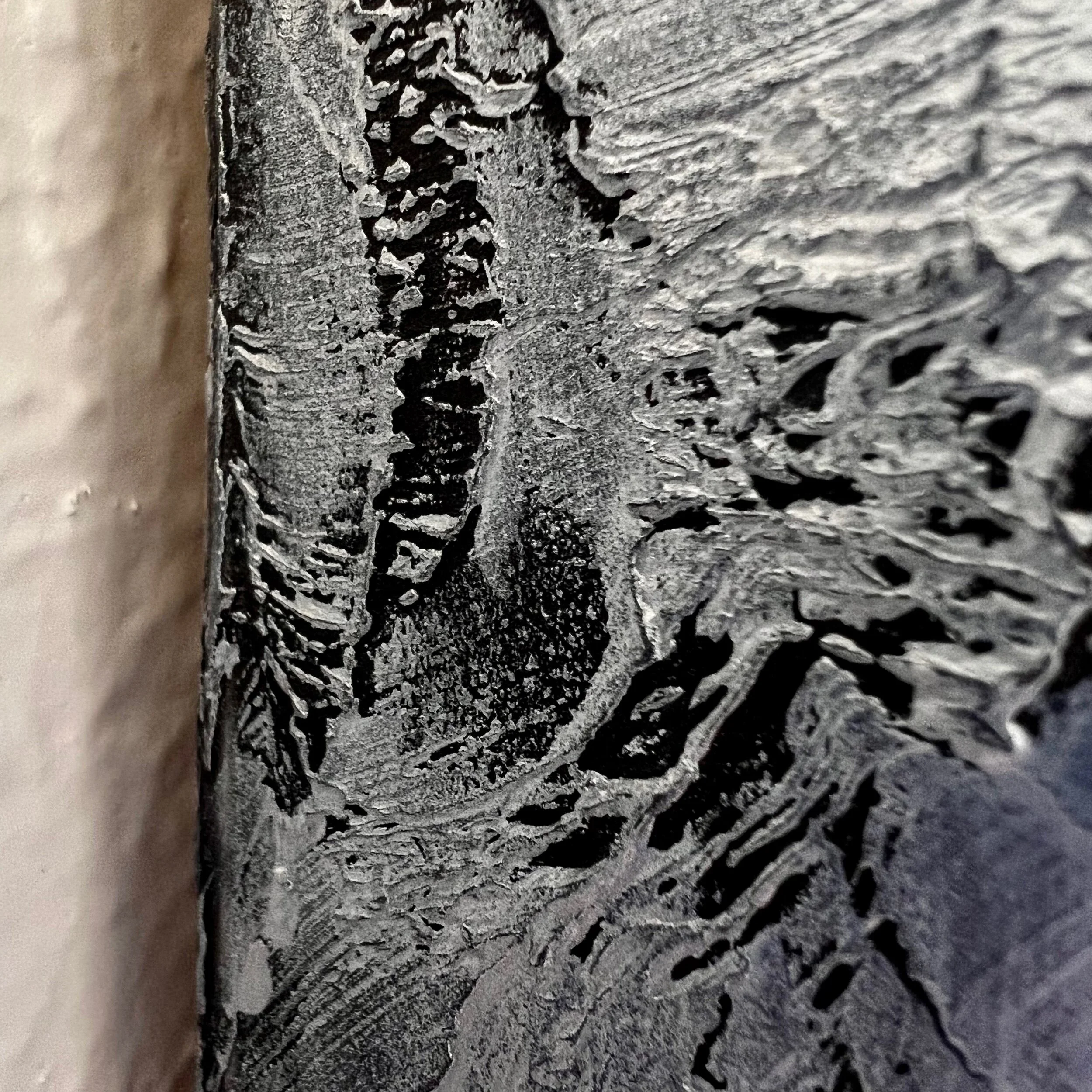 Pearl painting detail shot of canvas side using black and silver