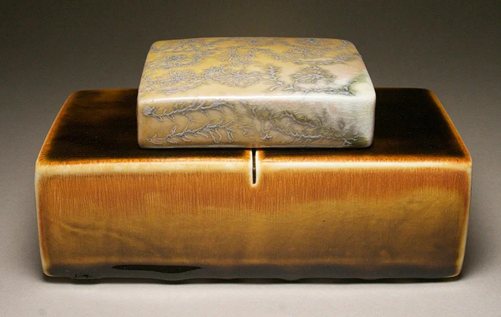 <i>spring rain </i>, porcelain, c/10 red. soda fired, h. 3" x w. 7" x d. 4", 2009