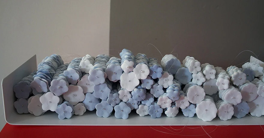 <i>frail hope, internal distance: object XI</i>, porcelain, mono filament, metal shelf, h. 2 1/2" x w. 15" x d. 6" 2013