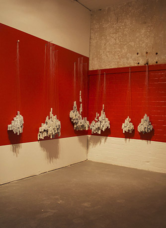 <i>Layers of Mountain, installation view</i>, Hunter College CUNY, porcelain, mono filament, metal pin, 2003
