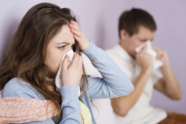 graphicstock-sick-woman-and-man-have-cold-flu-and-high-fever_B0xjxpYhb- copy.jpg