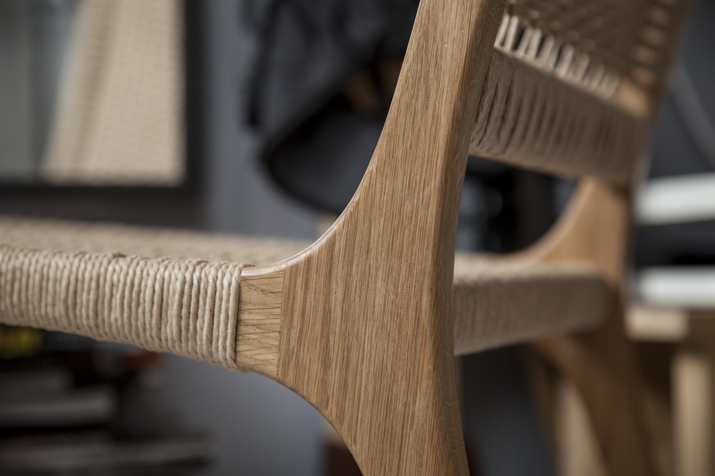 Detail of the leg joinery and horizontal stretcher beneath the seat.
