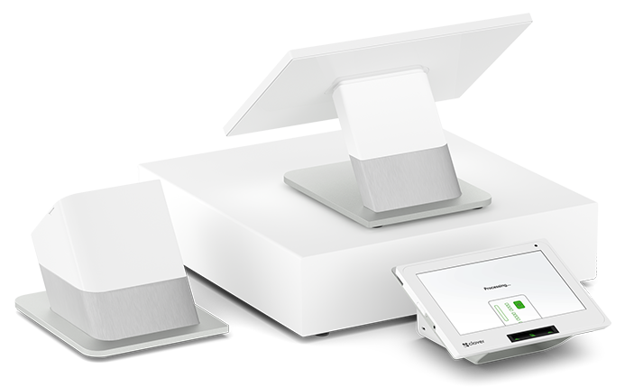 A white flat-screen electronic device with a stand and a tablet-like screen displaying a green battery icon.