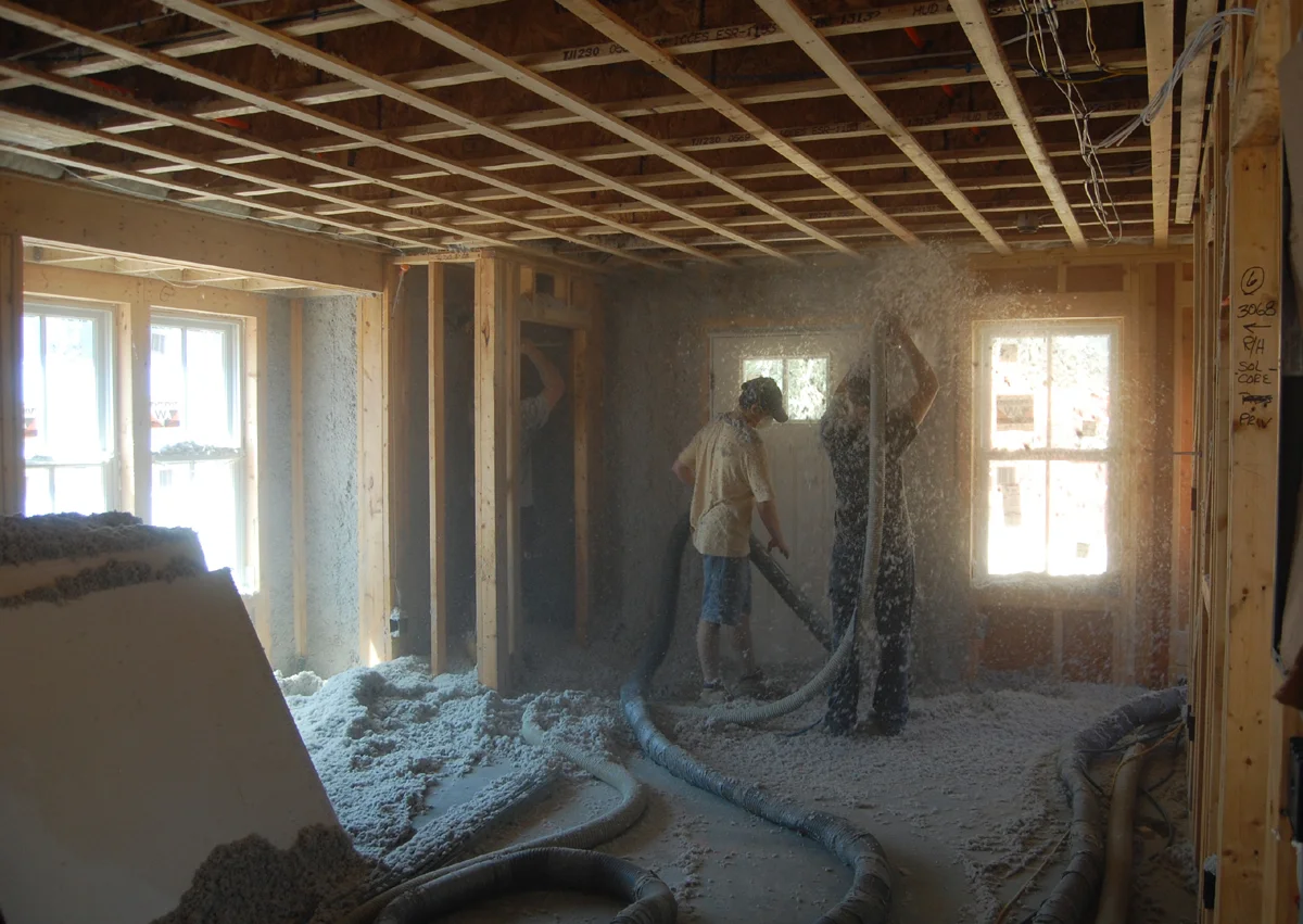 Blown in cellulose Insulation being installed at a project