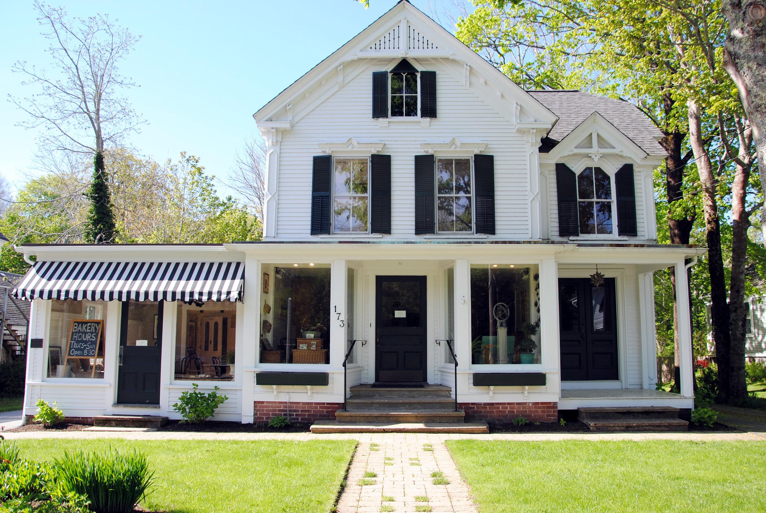 Happy Fish Bakery - the classic black and white color scheme and decorative gothic style details