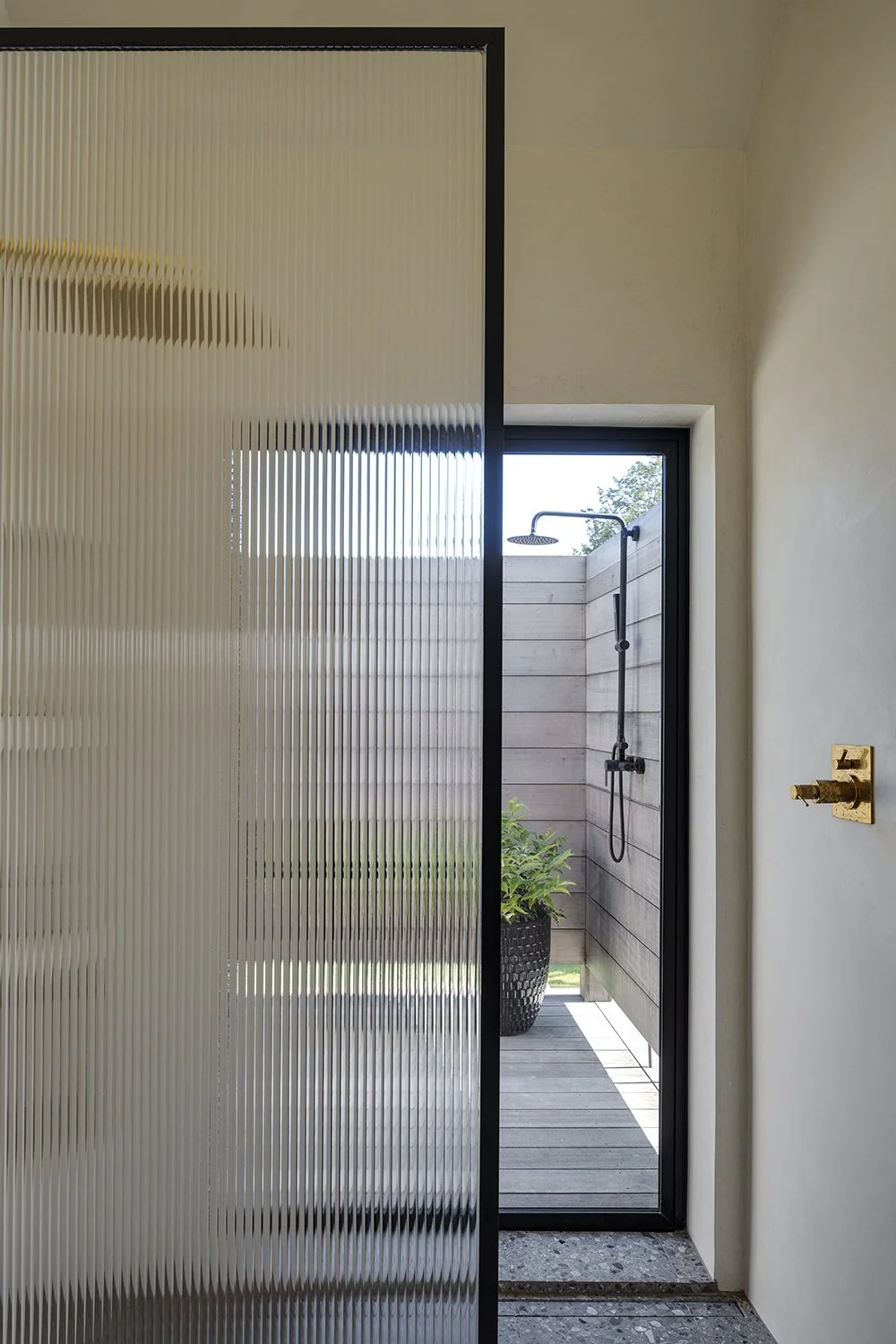 Orleans-Net-Zero-primary-bath-shower-A3-Architects.jpg