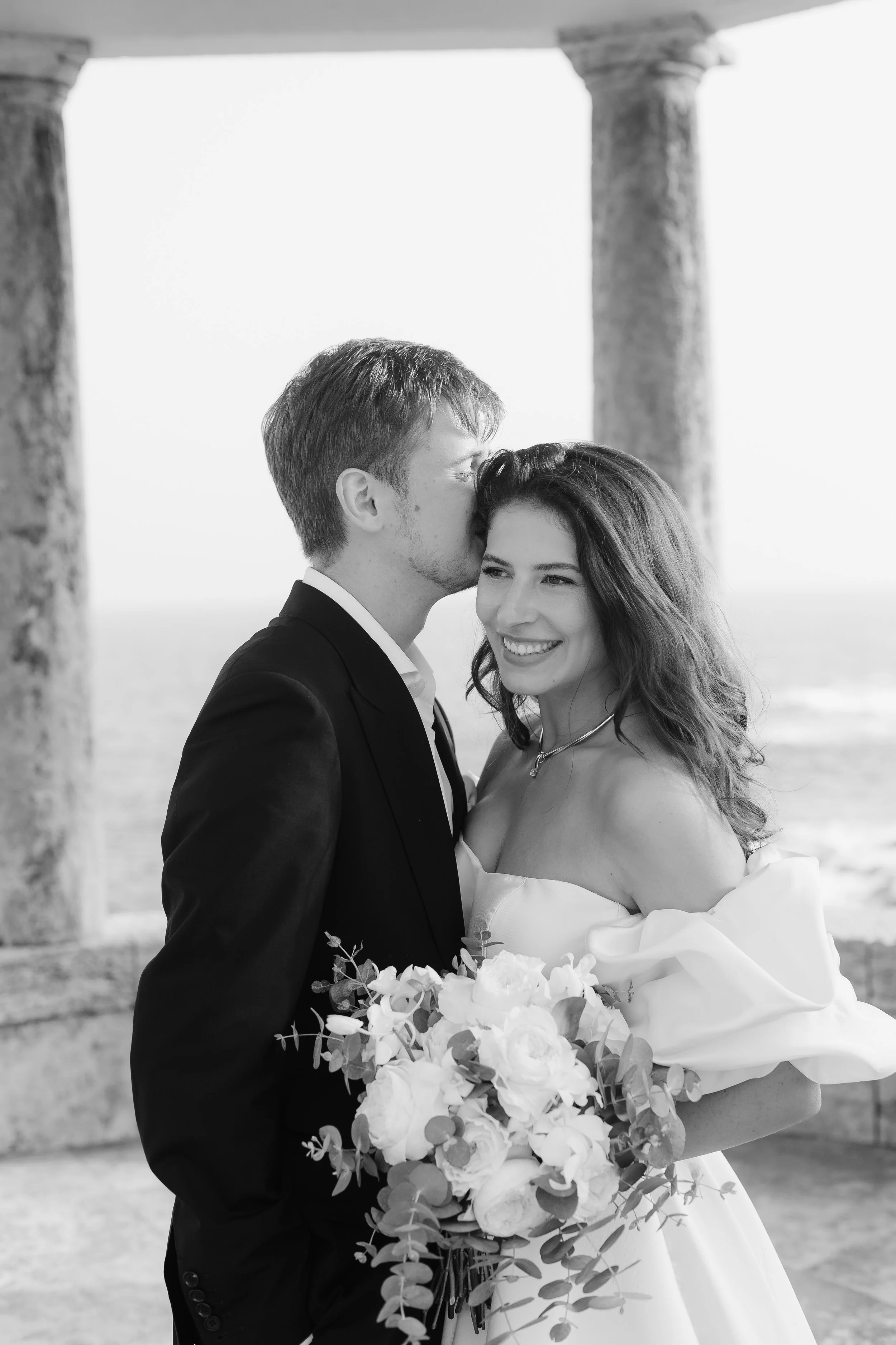 Bride and groom during a destination wedding in Catalonia with natural bridal makeup.