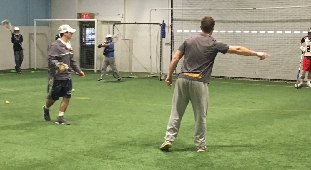 Coach Shevitz (L) and Coach Page (R) working the goalies through station work.