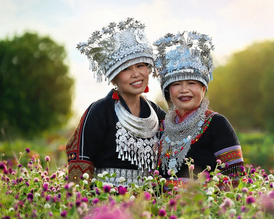 Portrait of a Hmong Mother and Daughter in a field of flowers, photographed by Nicole Mills Photography