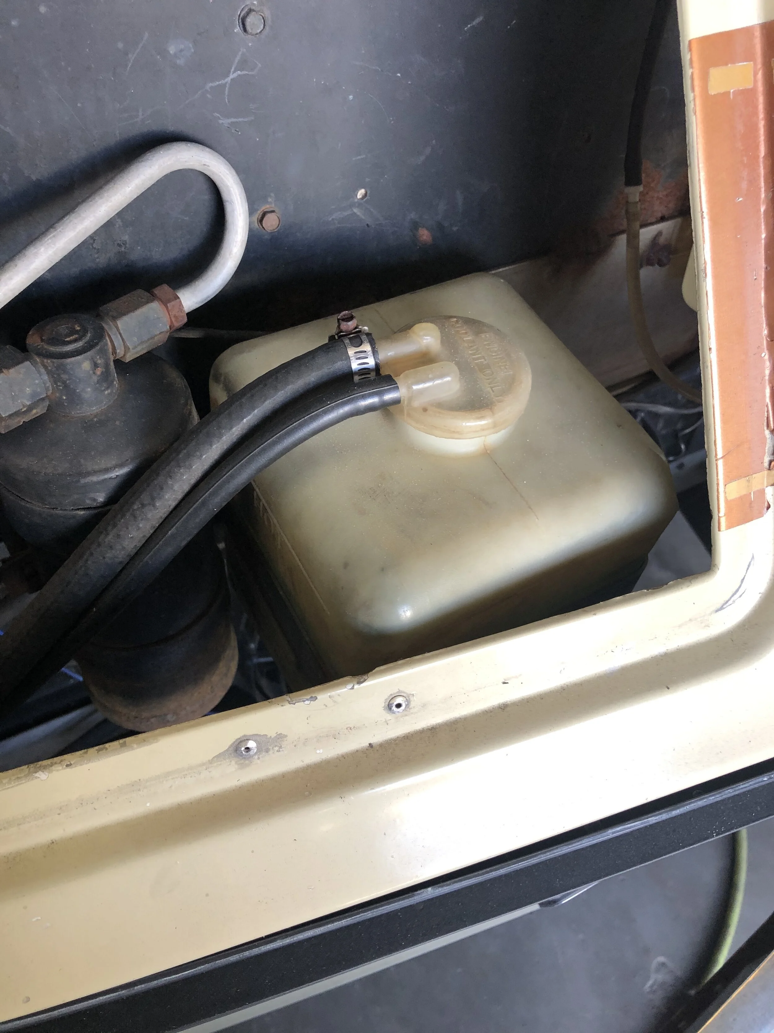 Radiator coolant overflow bottle and cap.JPG