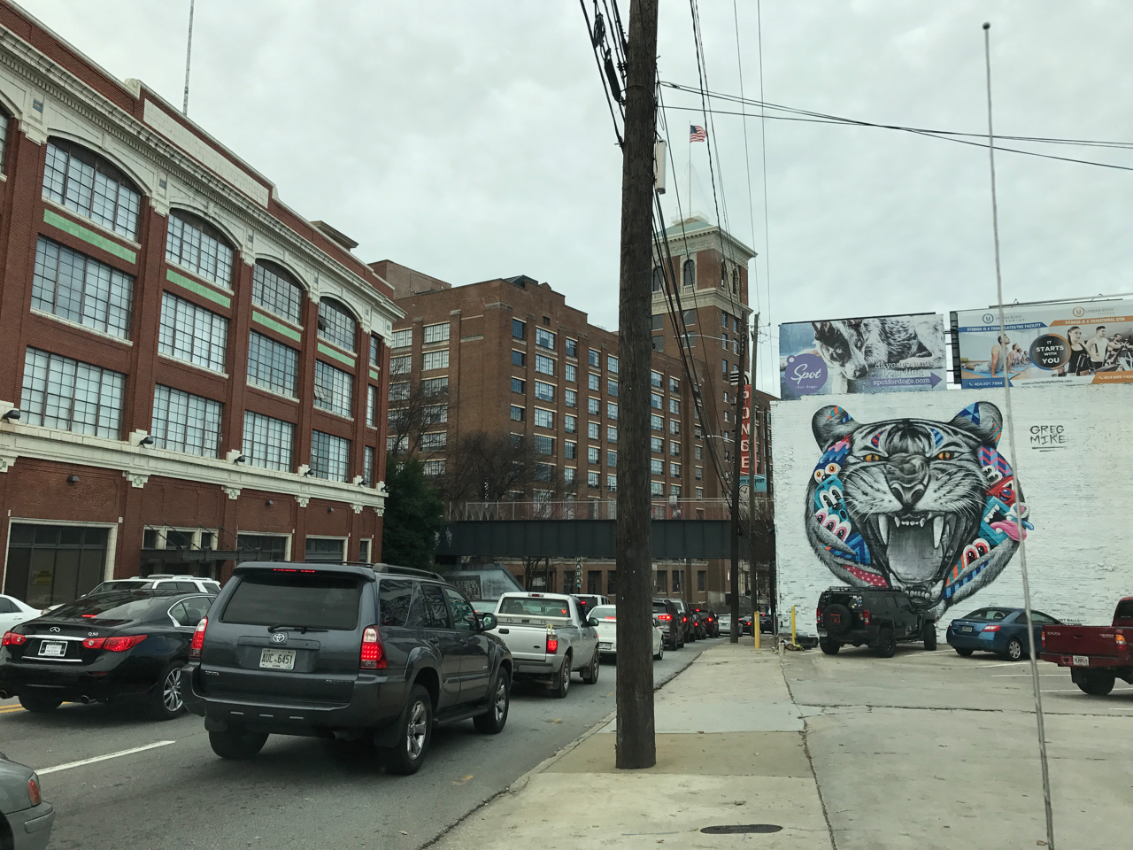 The building on the left is an example of loft apartments that were created after Ponce Market took off in popularity. Ponce Market is in center. Atlanta also has a vast mural collection throughout the city. Cool mural Greg Mike.