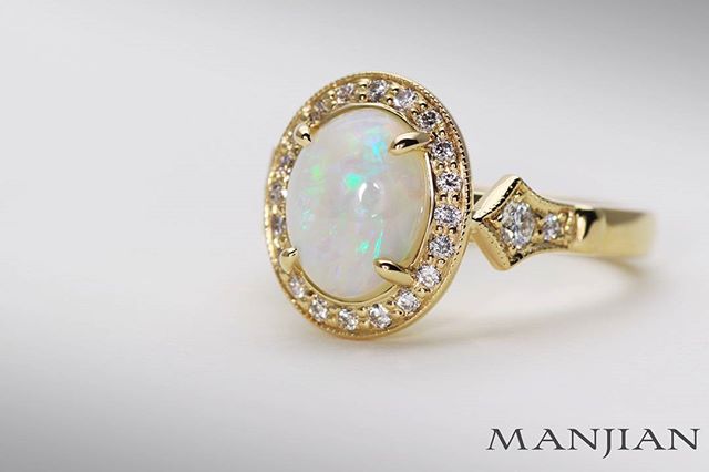 And here's the studio pic. Natural Australian opal engagement ring features milgrained pave set diamond borders and spade shields to create the vintage look and feel.