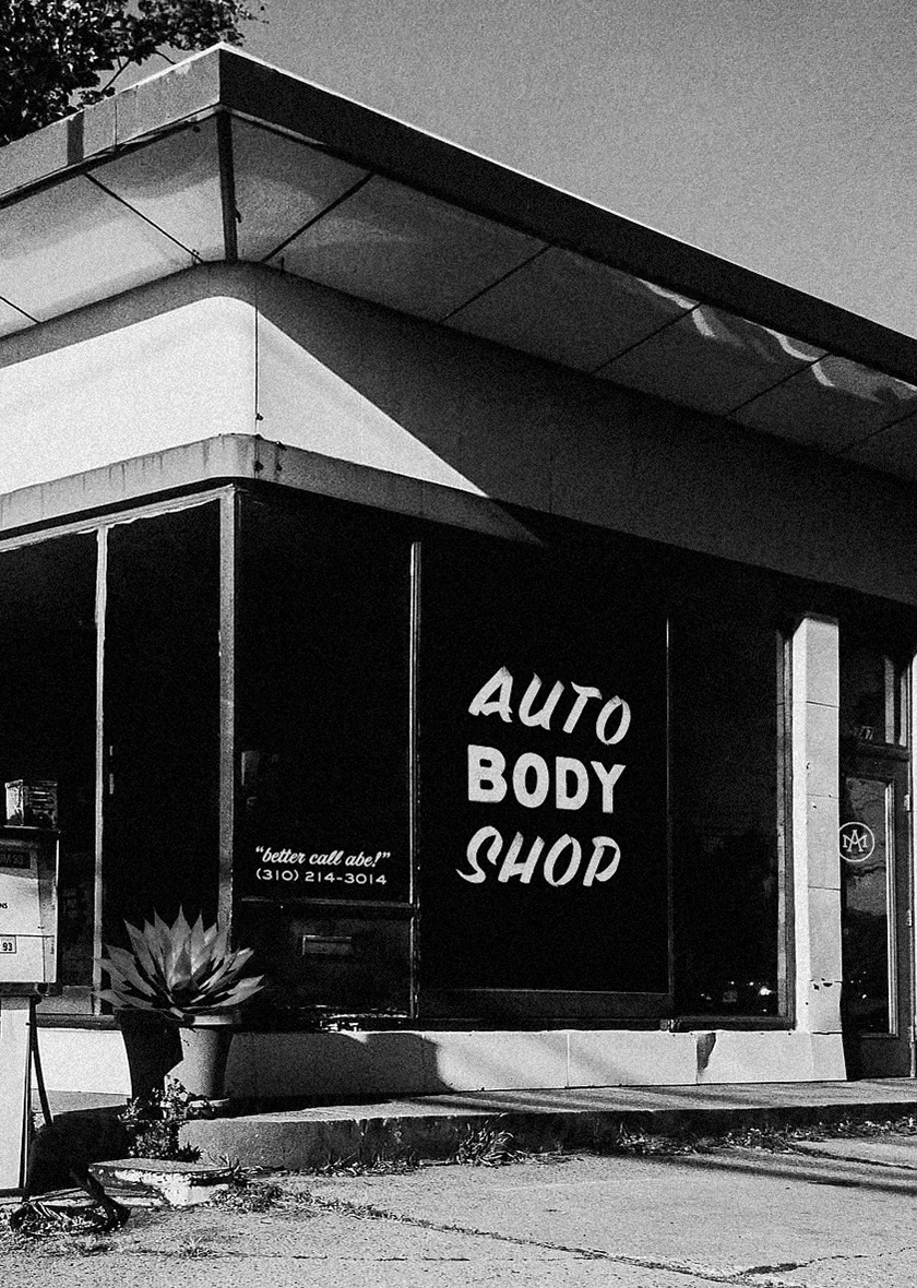 ManhattanAuto_Exterior_WindowsSign.jpg