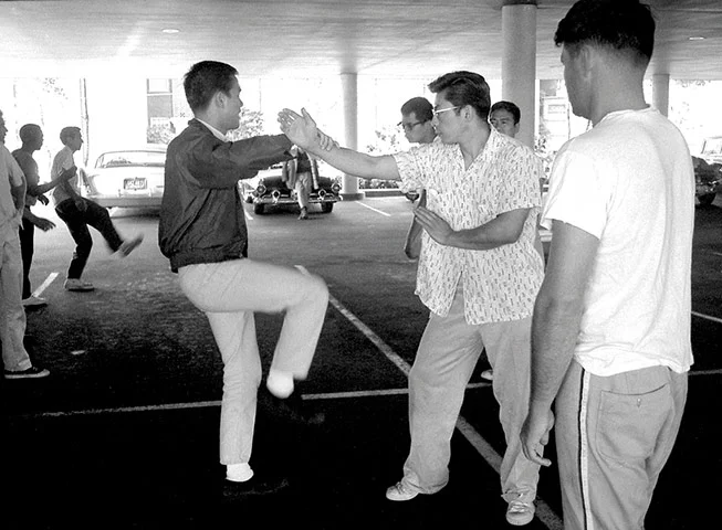 Training for Bruce Lee's first class in Seattle in the early 1960s was highly informal. The location was a covered parking garage, no uniform required.jpg