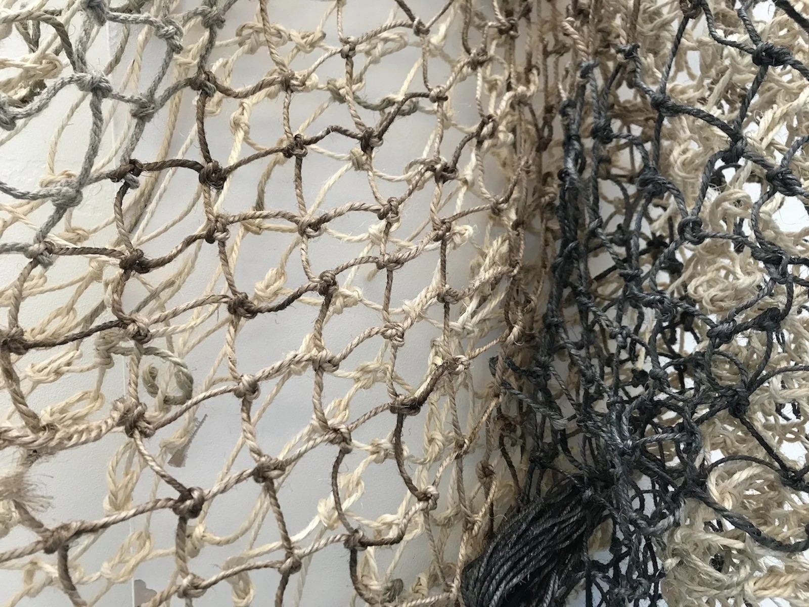 Large knotted net made from sisal fibres, partly dyed with walnut ink