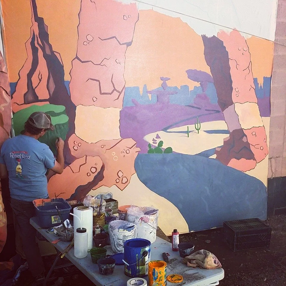  Painting two 14' murals with the Art Department 