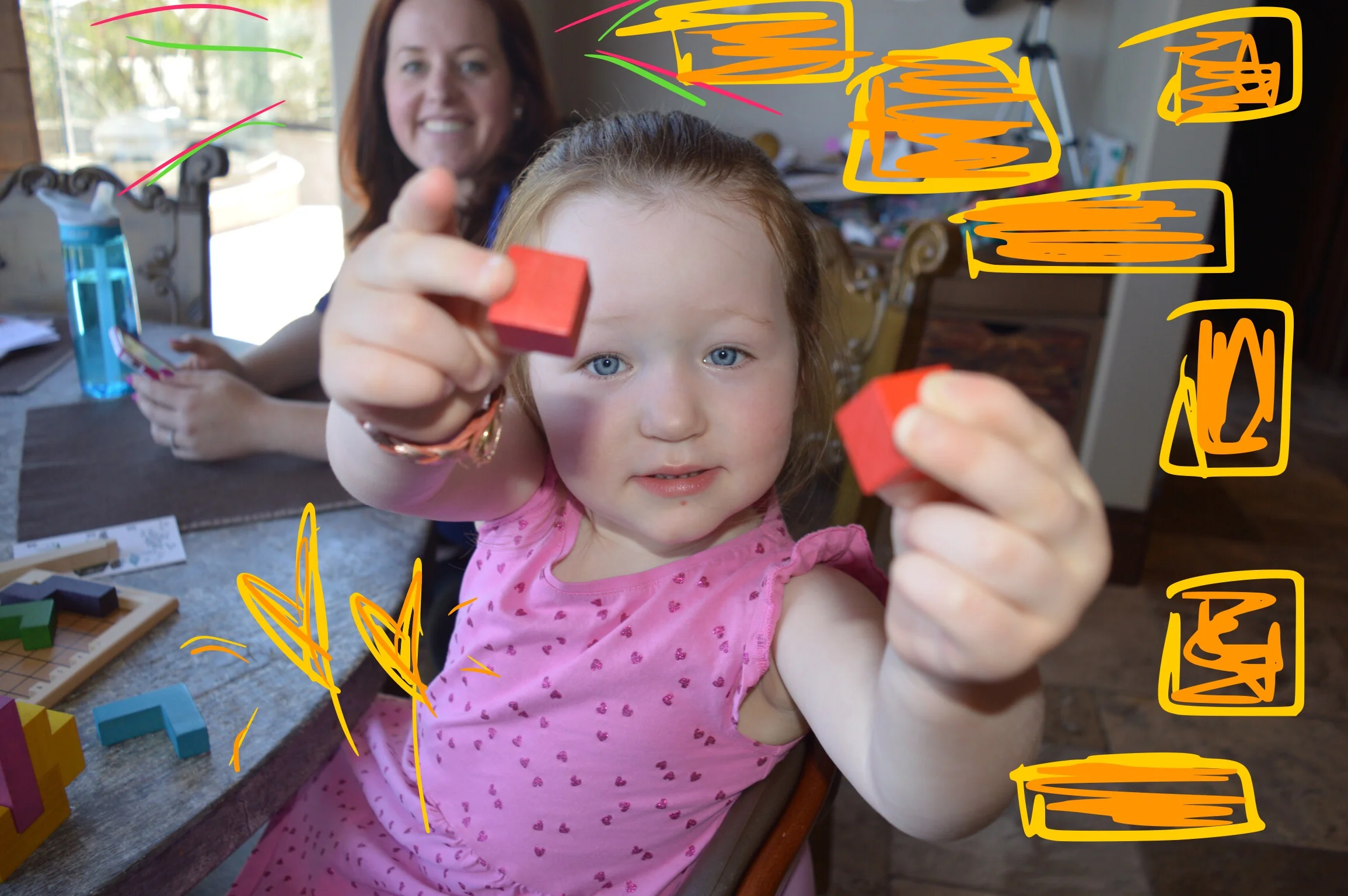 Proud VEGASMAMA with her daugther, Kezi, holding two wooden BLOCKS...perhaps a metaphorical reference to her and her upcoming BLOCH baby sister?