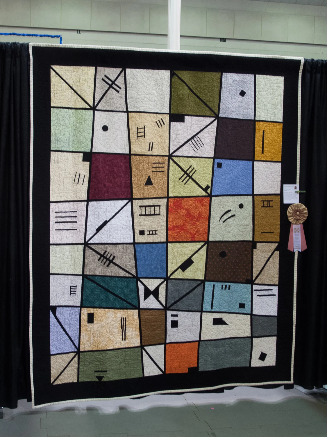 Thousands of tiny stitches: my first quilt