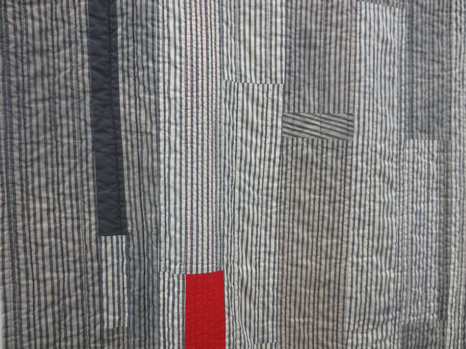 QuiltCon: Menswear, muted exurberance