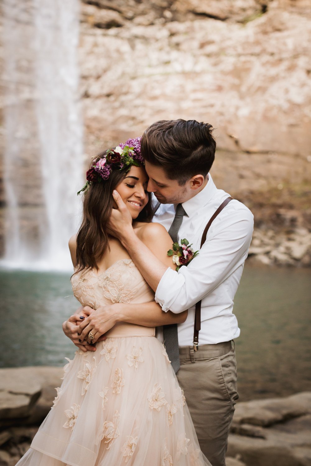 What is Eloping and Is It For You? Couple standing close together as they pose for a photo during their elopement photoshoot