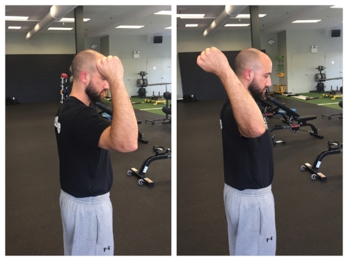 Left: Limited Active Shoulder External Rotation. Here back squatting isn't the best option because shoulder doesn't have enough mobility to safely hold loaded barbell. Right: Good Active Shoulder External Rotation.
