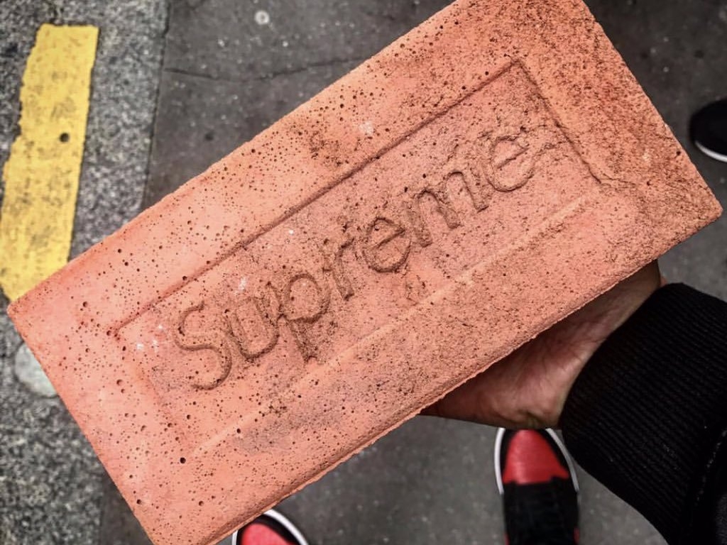 Supreme fan Frank Lamo with his brick 