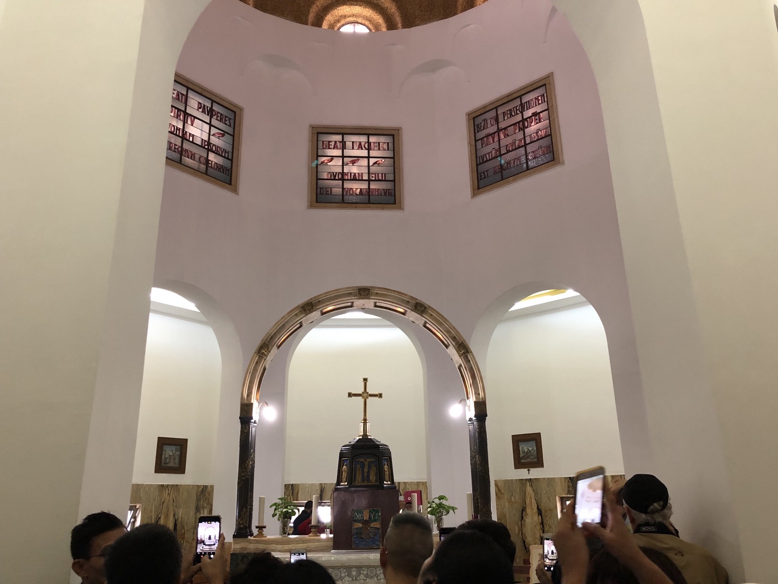 Notice all the phones taking a picture of the altar