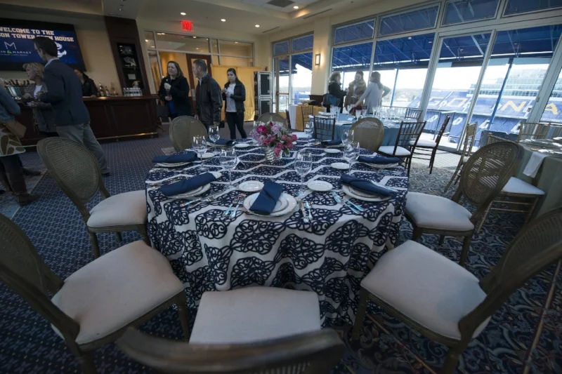 beautiful linens from Select Event Rental and a peek of the Navy Stadium view
