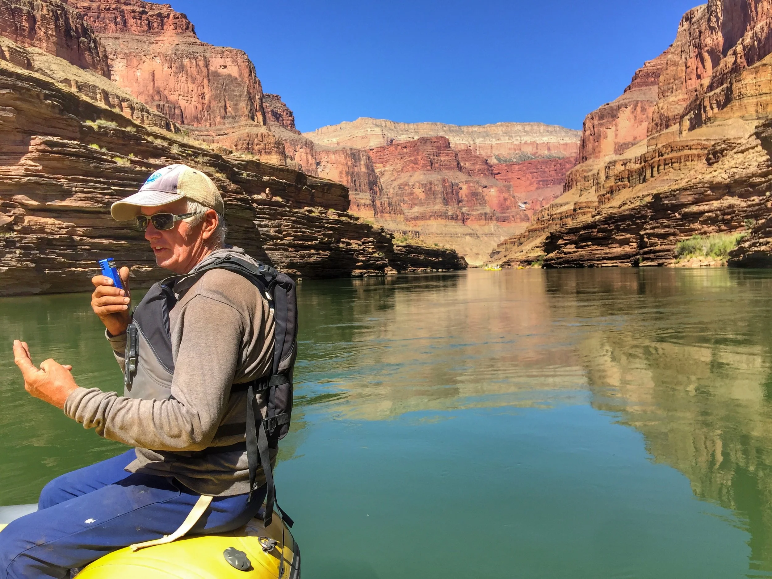 Mandela interviews her mentor, Glenn Goodrich, while they guide their paddle rafts down the Colorado River in The Grand Canyon.