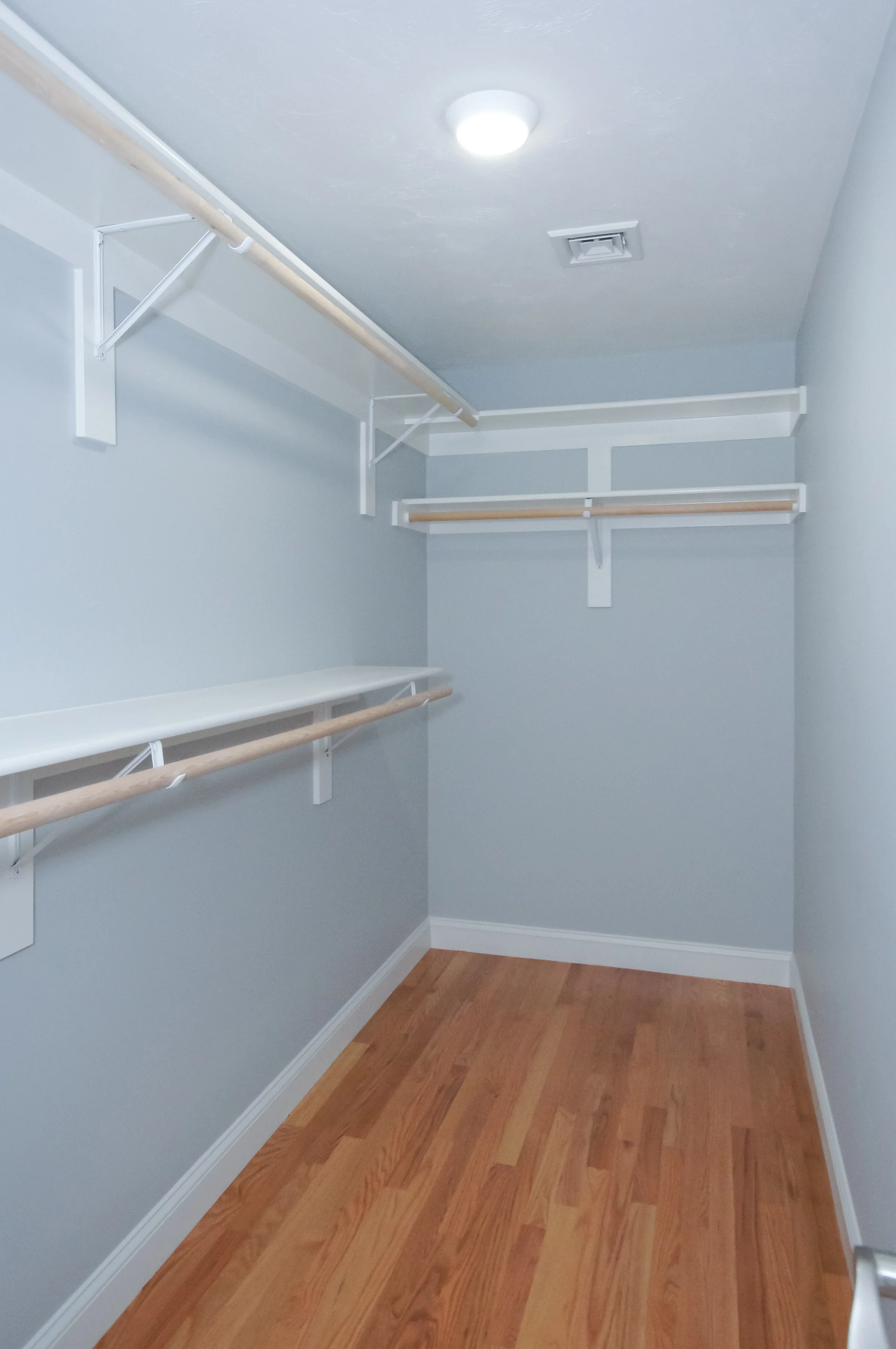 closet with custom built-in shelving