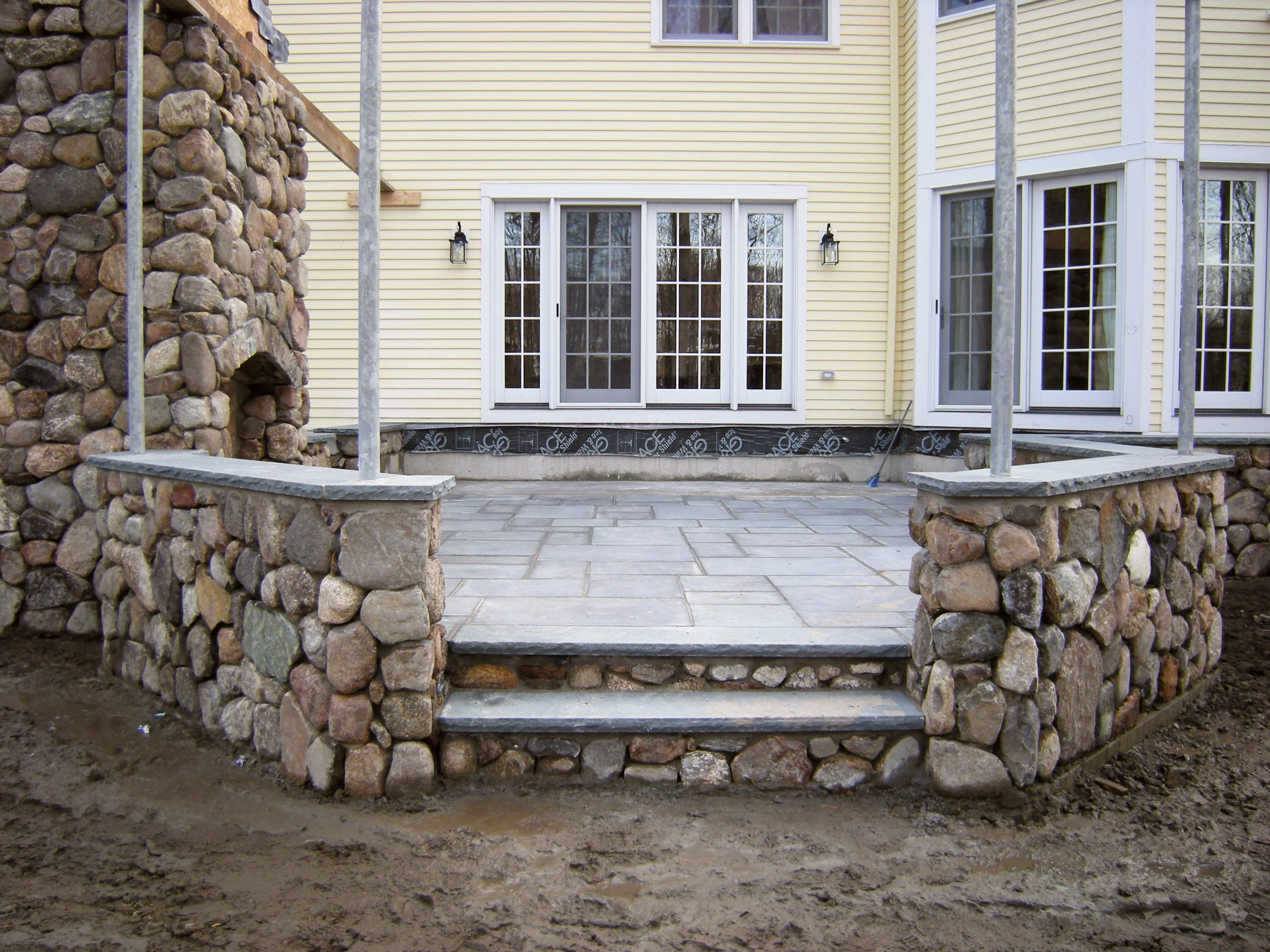 pergola: outdoor stone fireplace