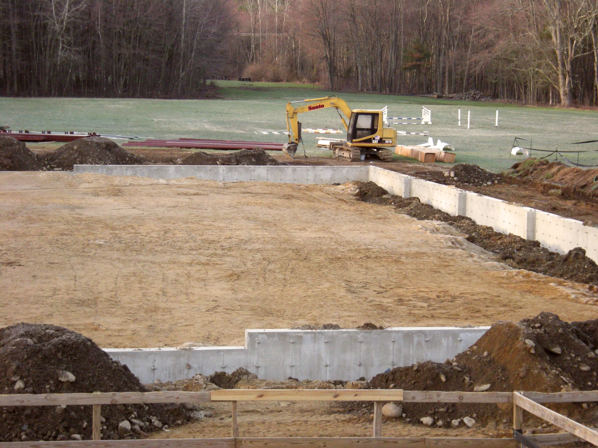 horse arena foundation site work with Santo Construction equipment