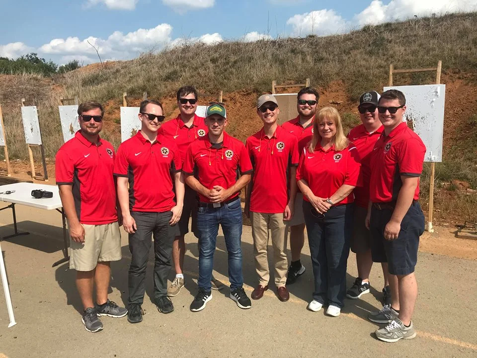 Pictured from left to right: Ben Simpson, Jason Boase, Logan Grant, Tyler Starke, John Kerr (not a board member), Corey Grimshaw, Rita Redmond, Zack Blair, and Chip McConkey.