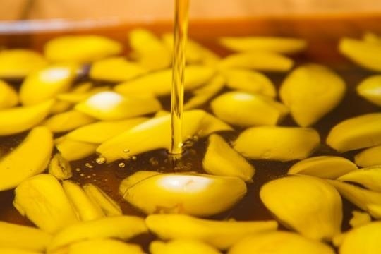 GARLIC & OLIVE OIL: Roasted cloves of fresh garlic served in EVOO over pasta