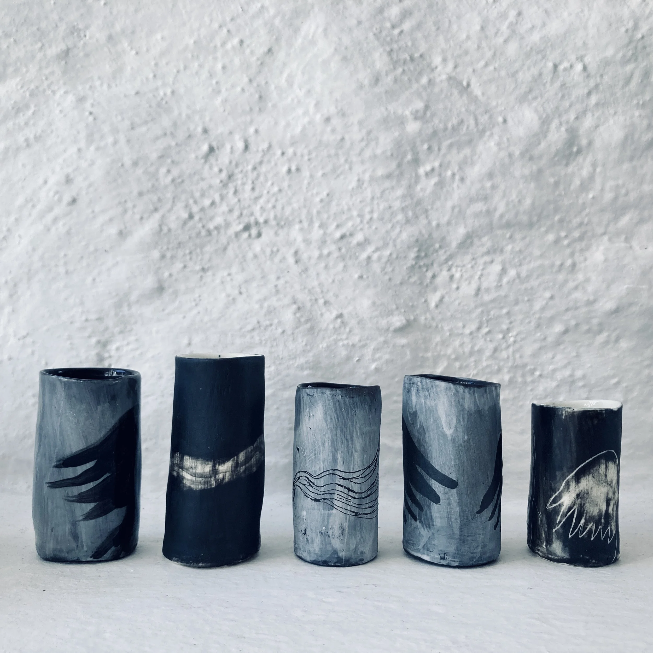 Black porcelain cups, backside