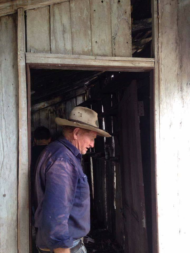  Dennis, the owner of Old Walloon homestead showing us around the falling down slab hut 