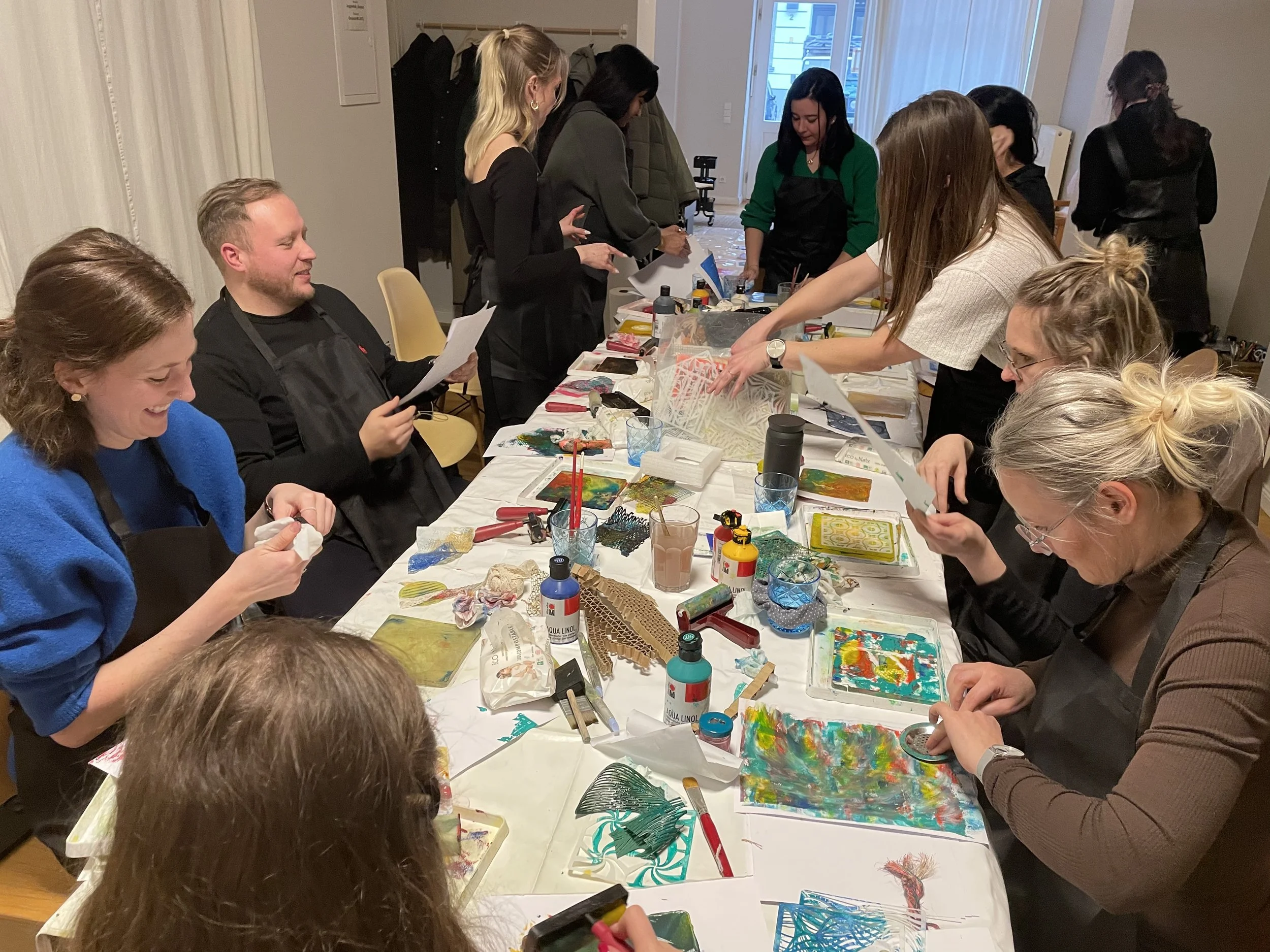 Hands-on collage during Make Art for the Office – colour, laughter, connection