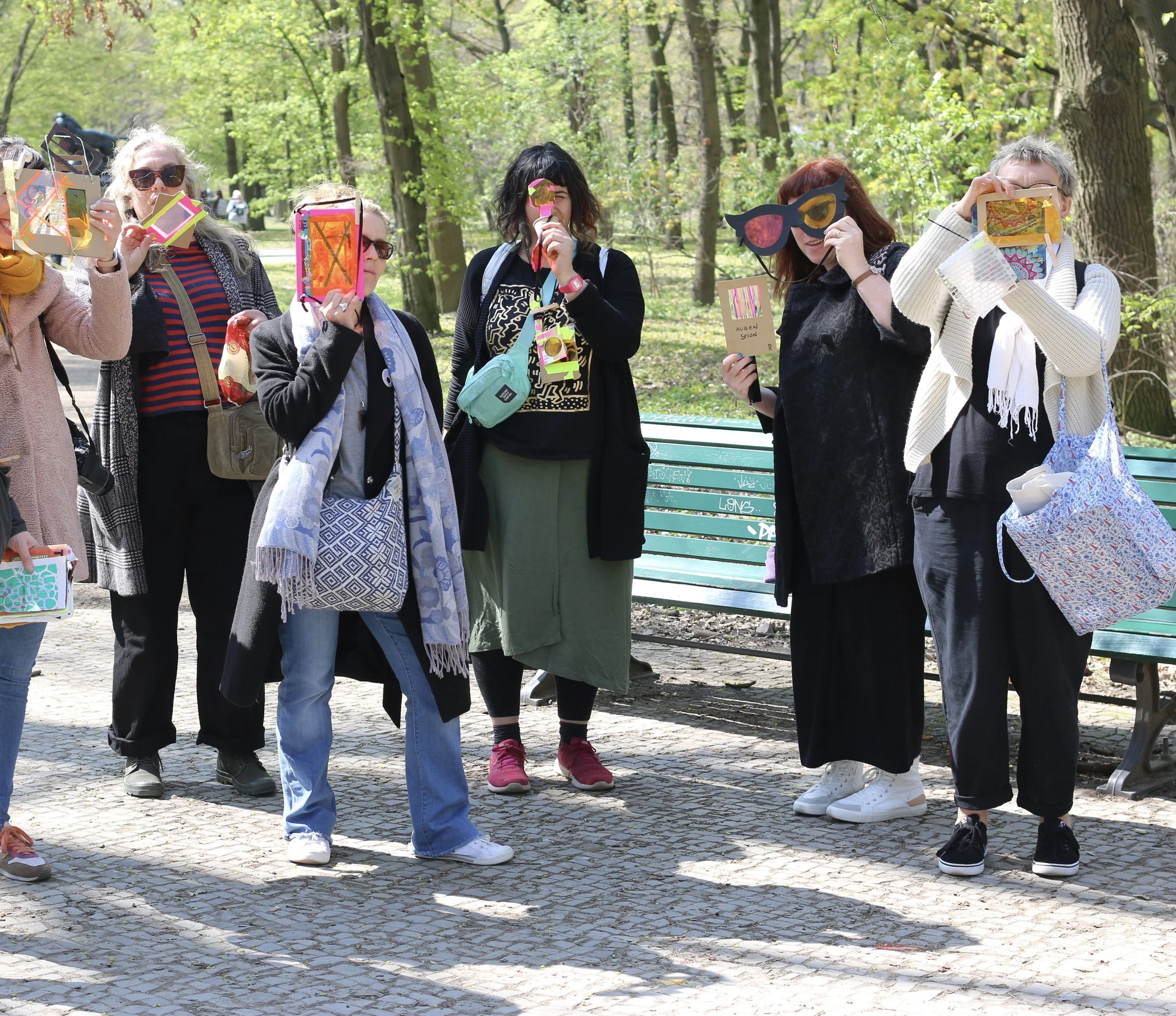 Art teachers using their homemade viewfinders exploring Berlin