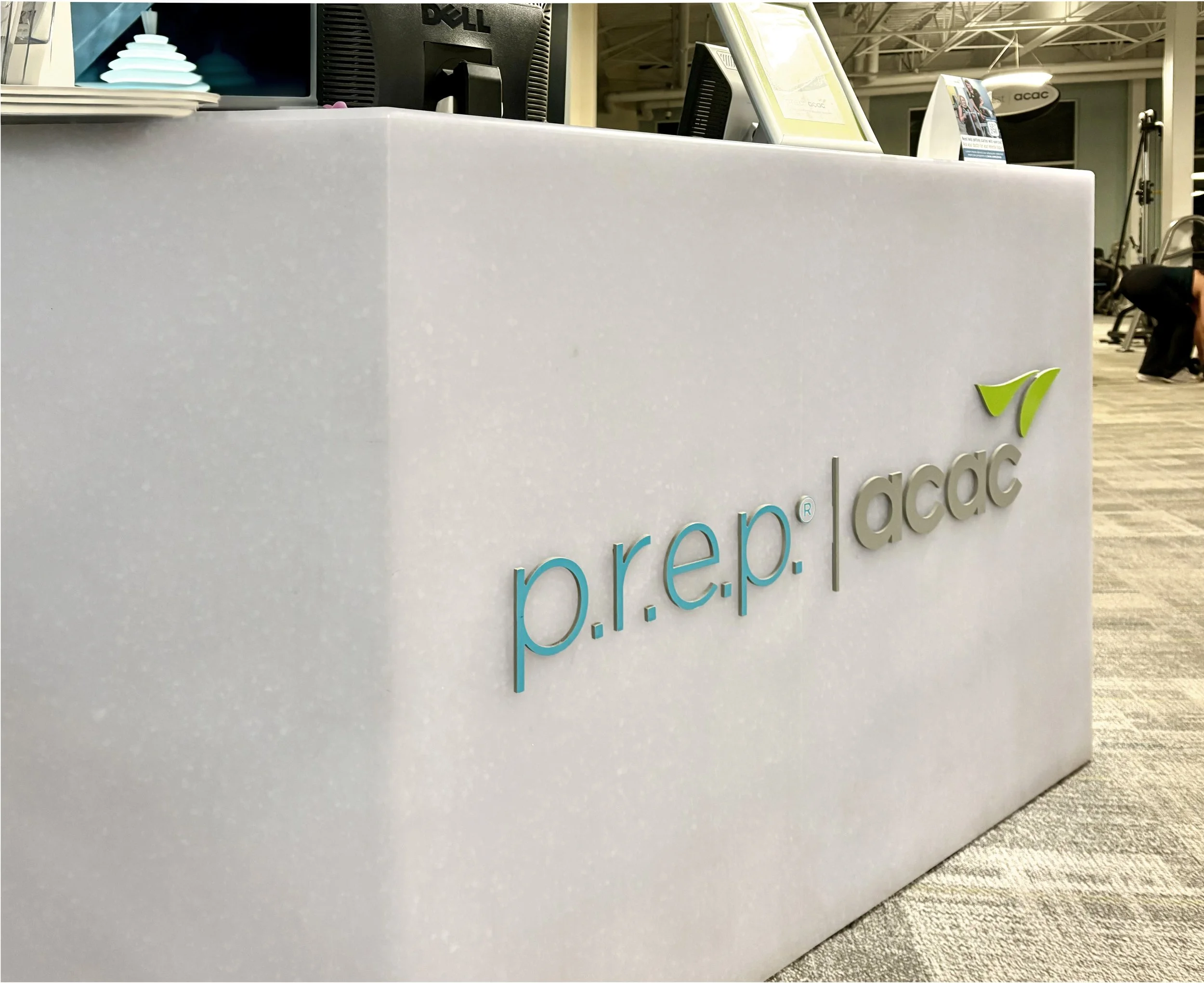 custom channel letters sign installation at acac Fintess and Wellness