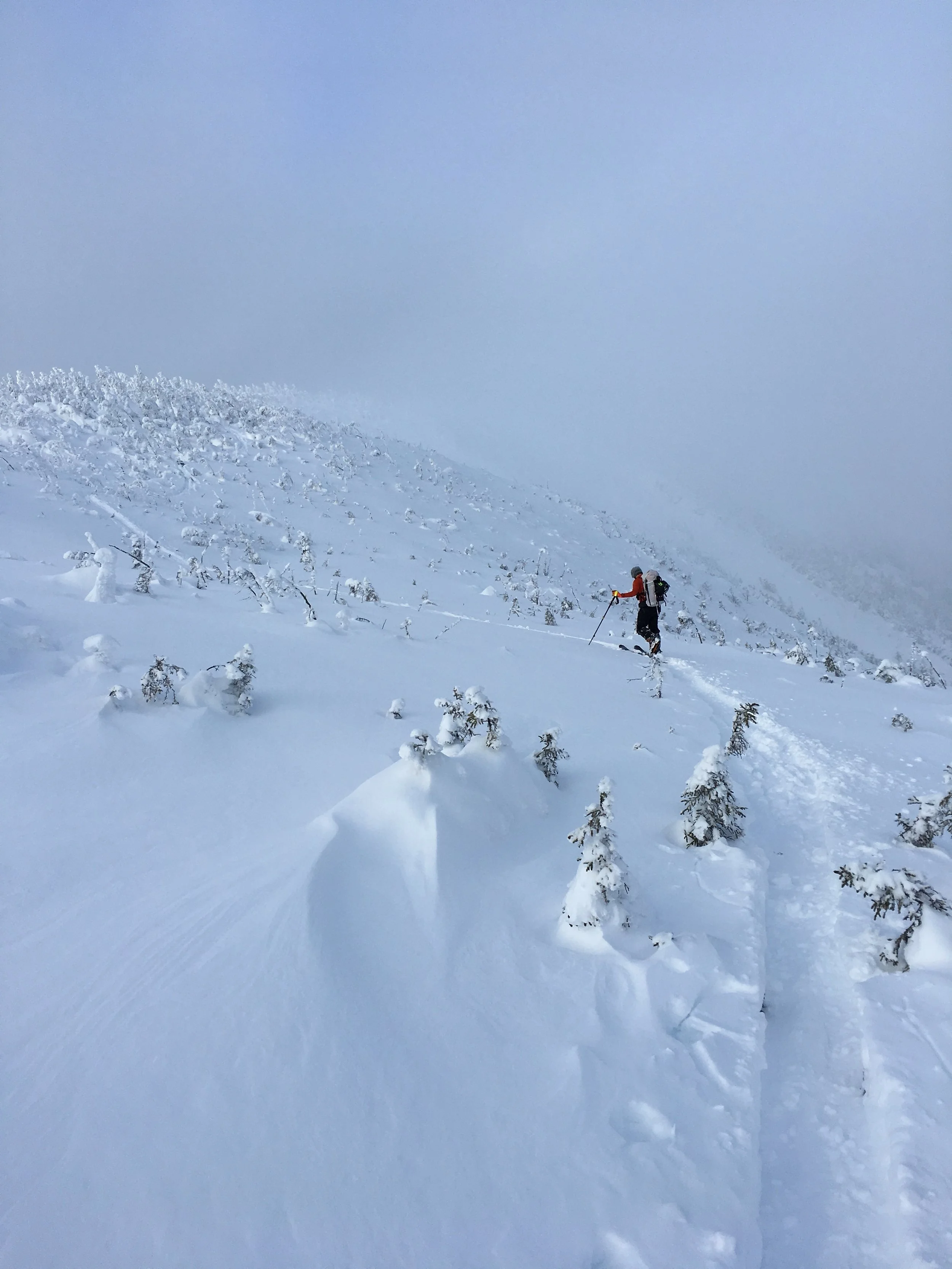 Traversing the ridge line and picking our ski line! 