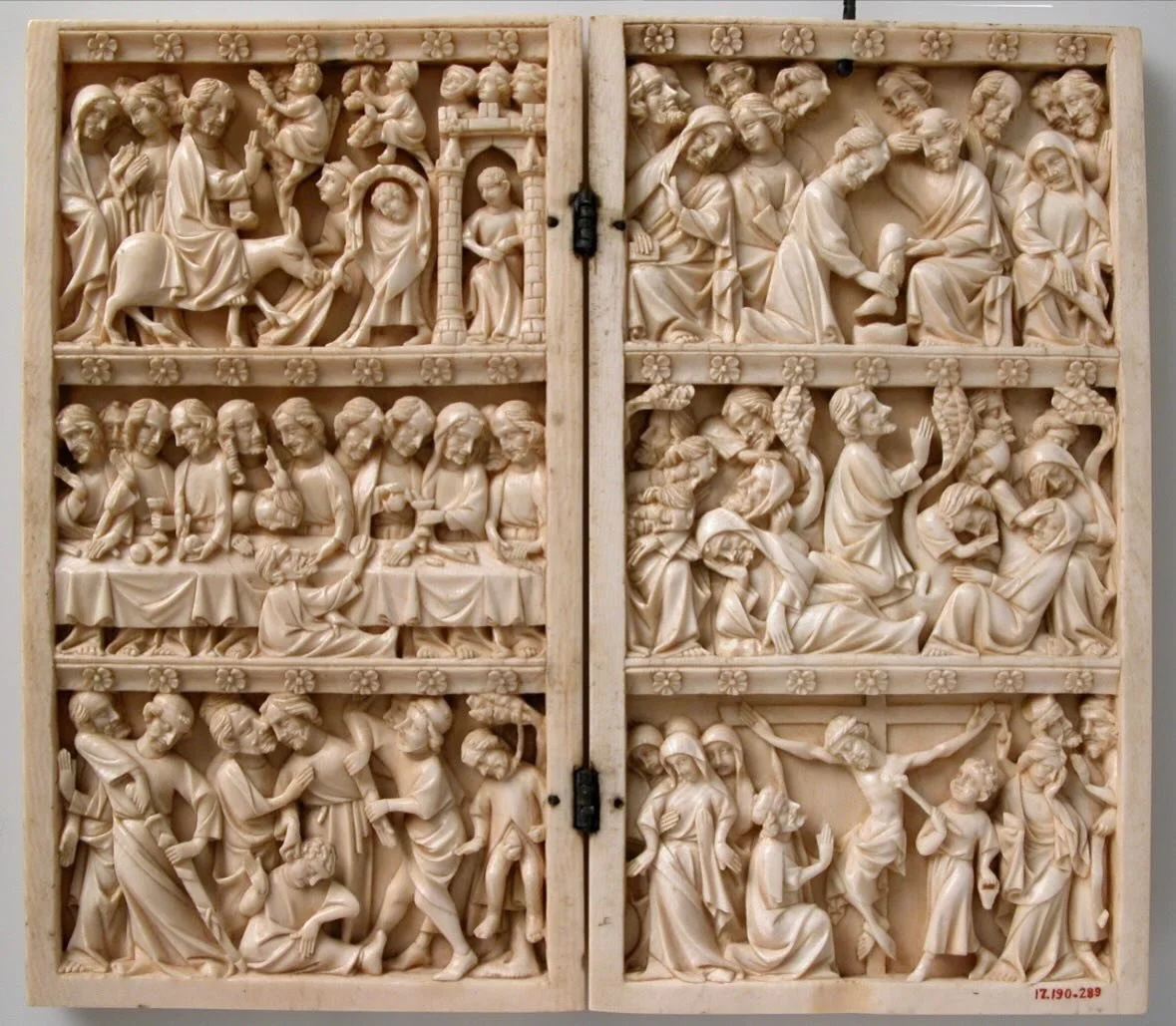 Before Jesus takes up his cross he washes his disciples feet and eats a meal with them.

The photo is of a 1350 diptych from France showing scenes from the passion of Jesus from the Met&rsquo;s collection. Jesus washing his disciples feet is depicted