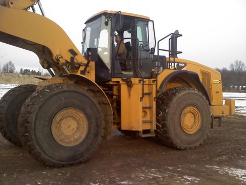 Jeff Koski and his loader showed up for last minute work on the track