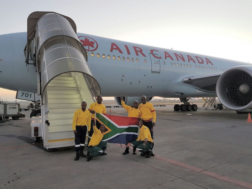 300 firefighters from South Africa arrive to assist Alberta.