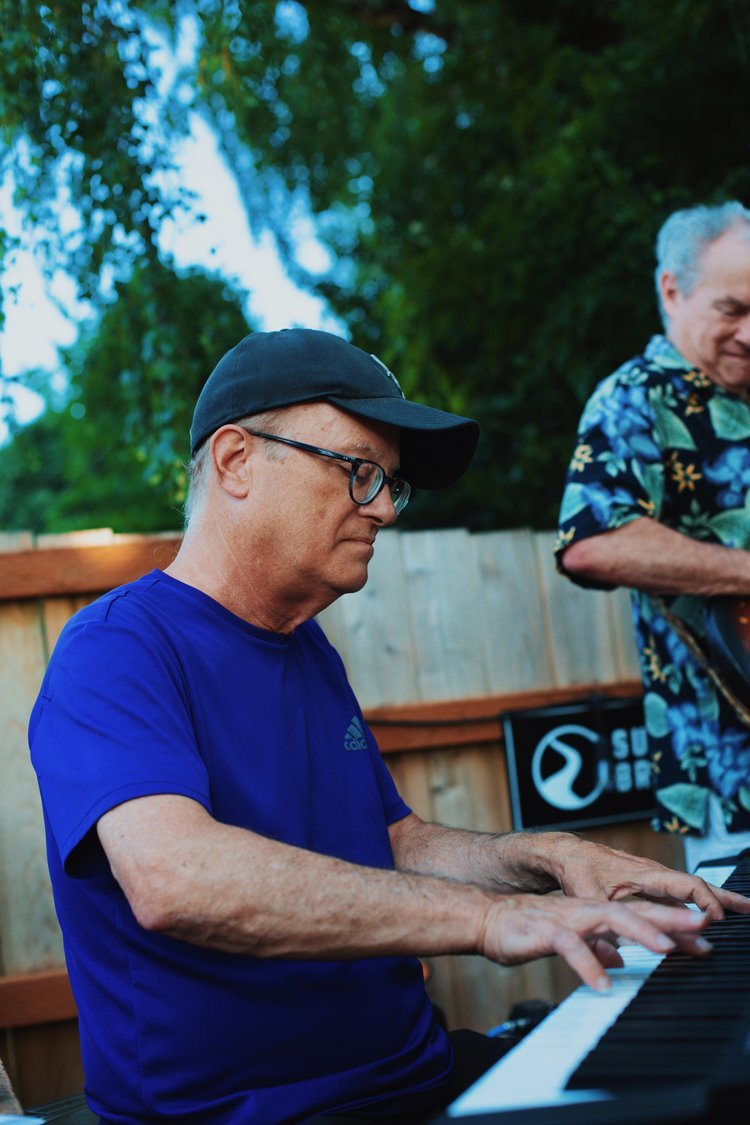 mike-blueshirt-piano.jpg