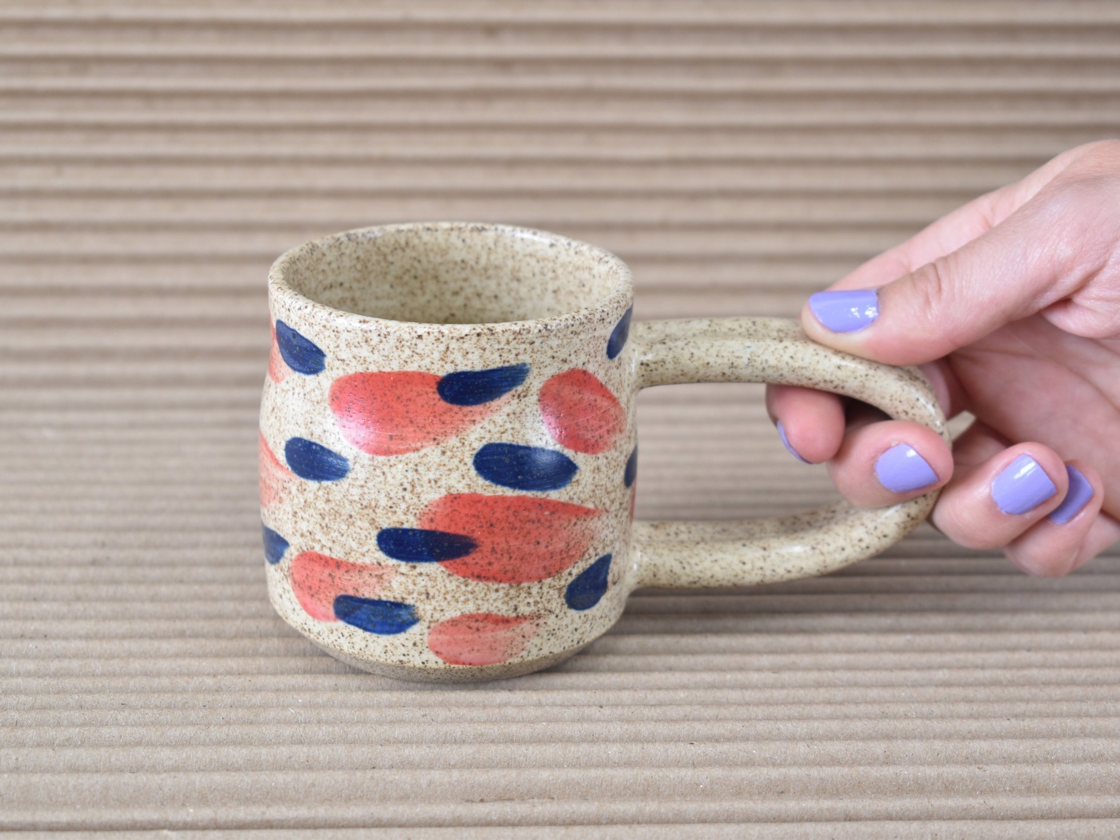 Speckel+Mug+Hand.jpg