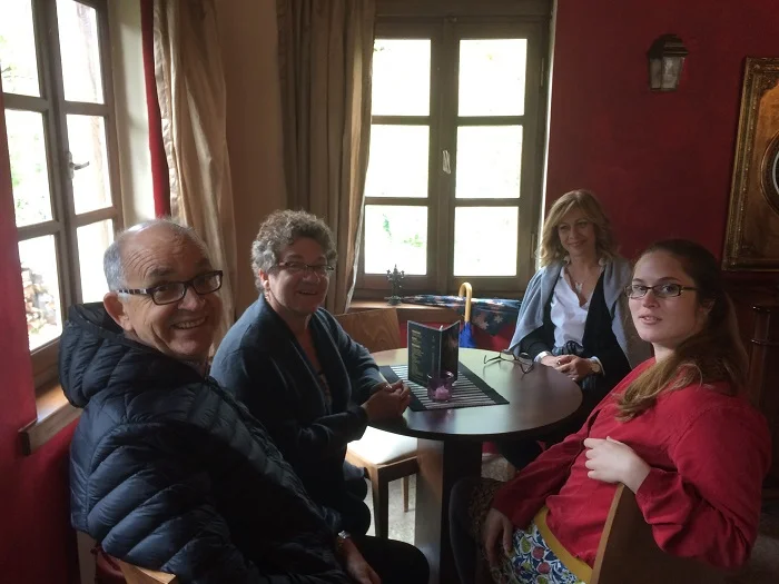 My greek family: round the table it's Nikos, my mom (Helen), Eftehia, and me (Katie)