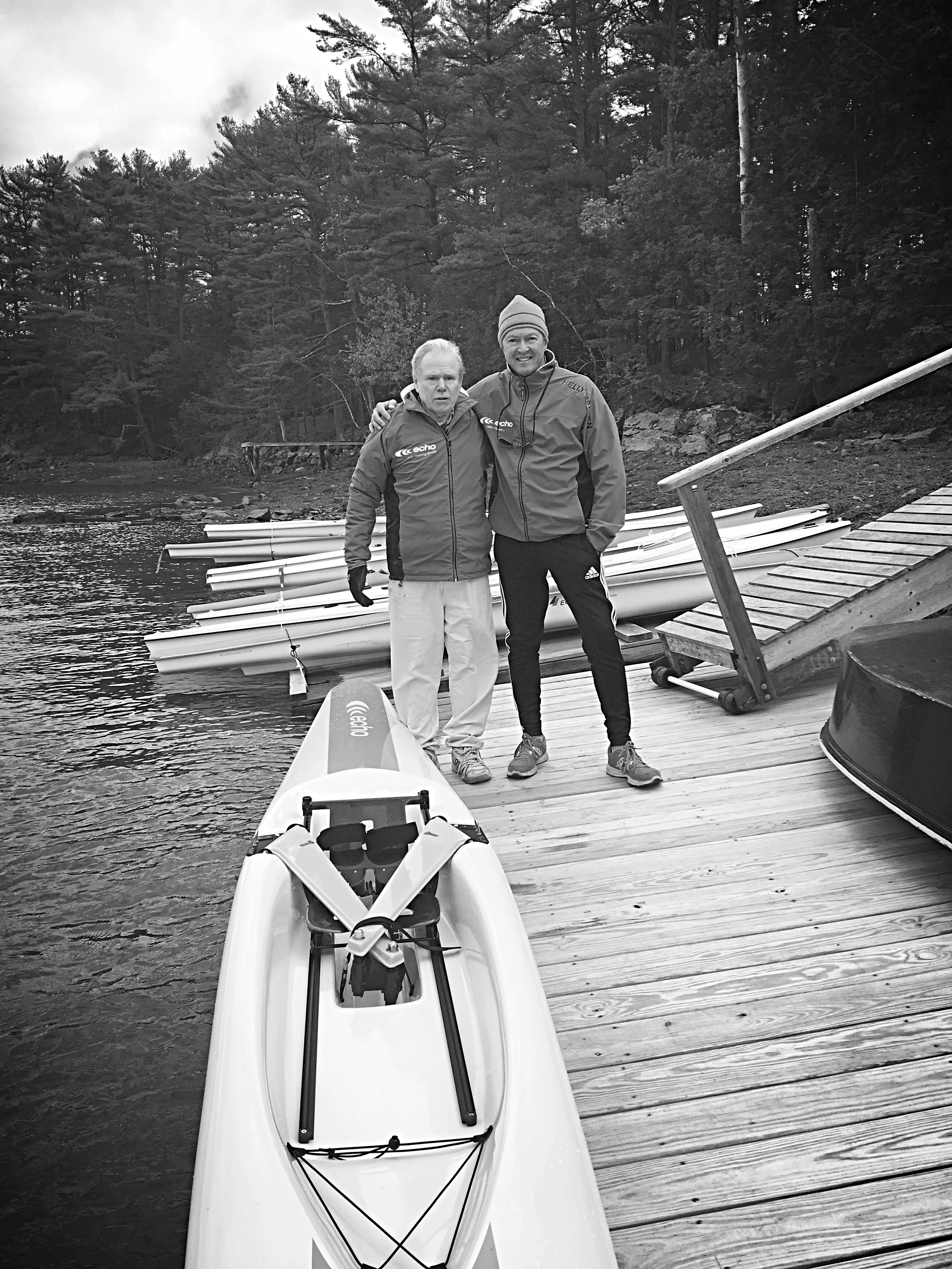 Steve Wood and Douglas Martin share a moment at the Chauncey Creek Boathouse in Kittery Point, Maine