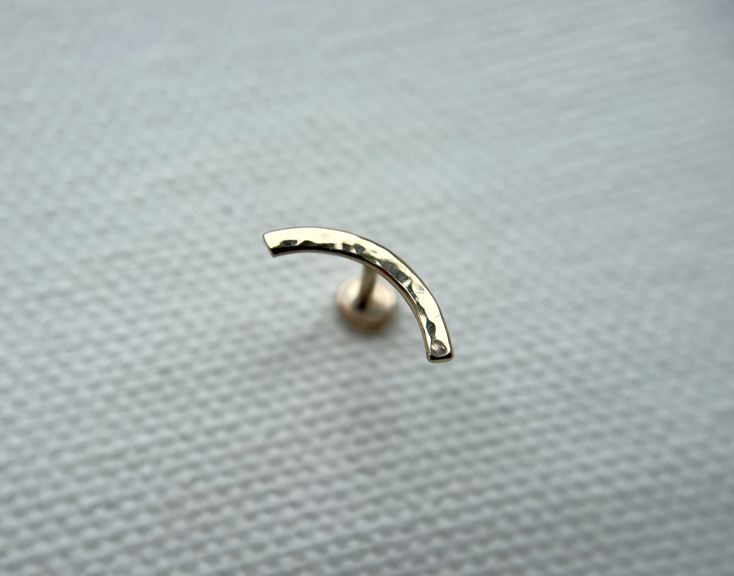 9ct gold hammered conch earring