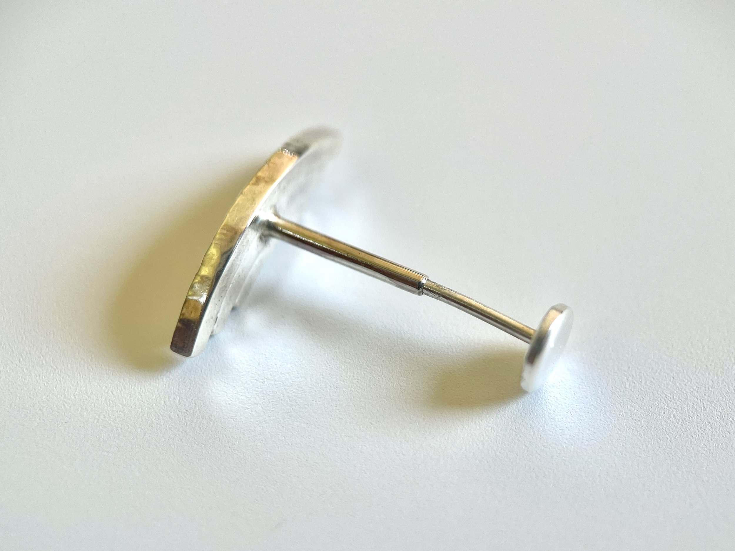 statement-silver-conch-earring-threadless-post.jpeg