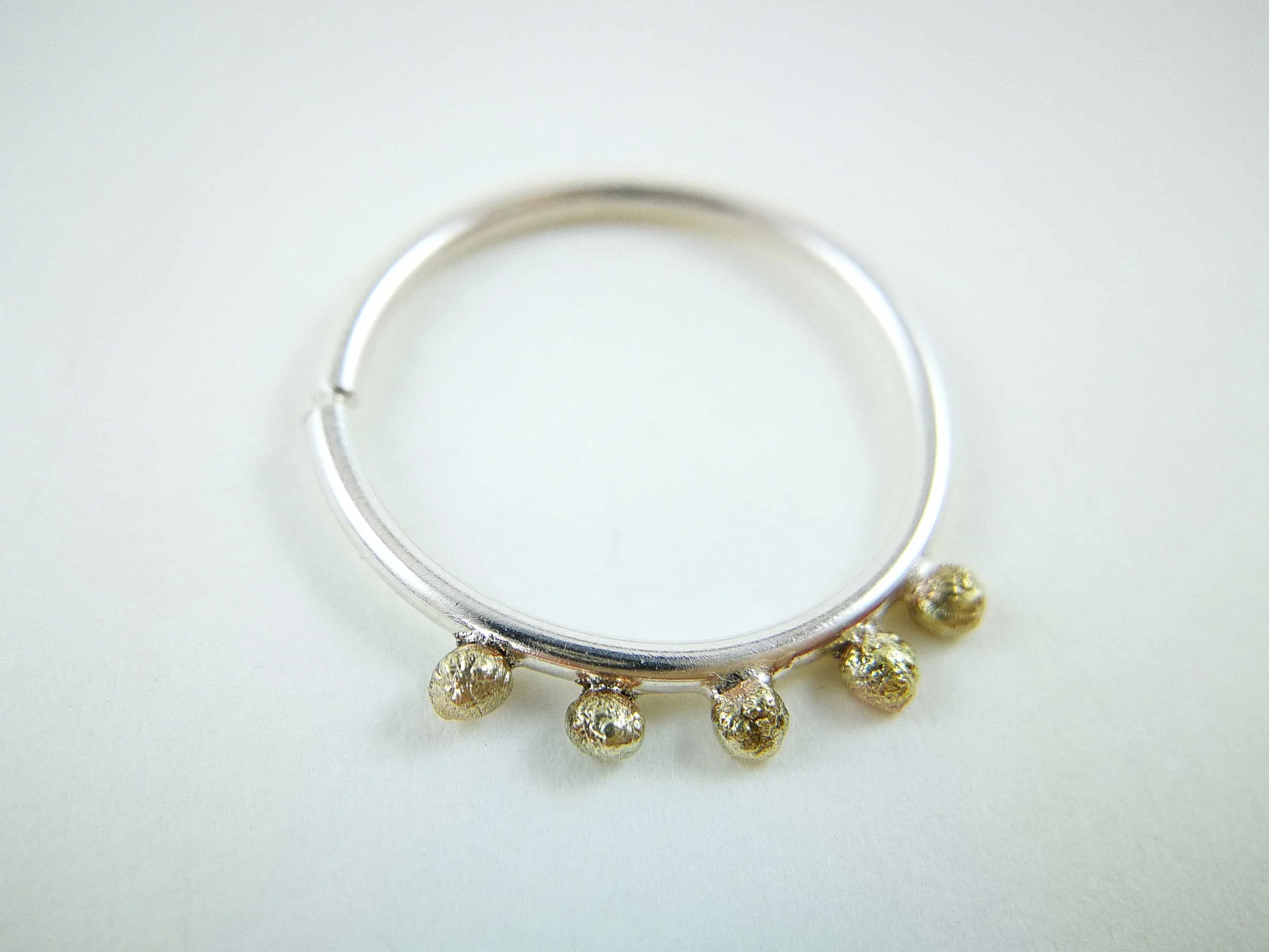 conch-ring-with-solid-gold-balls-product-shot.jpg